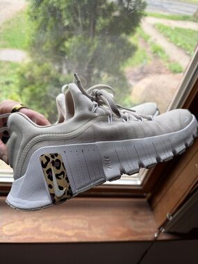 Nike Women’s Cream/White Athletic Sneaker with Leopard Accent